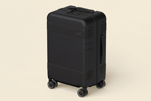 MOND Check-In 28″ hardshell in matte black with black leather band